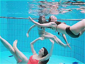 trio nude dolls have fun underwater