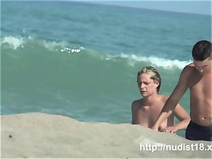 naked beach hidden cam shoots a sizzling honey with a hidden web cam